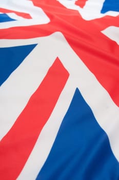 Detail of Silky National Flag of Great Britain Flag Drapery - Shallow Depth of Field