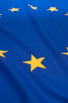 Detail of Silky Flag of Blue European Union EU Flag Drapery - Shallow Depth of Field