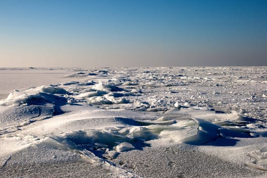 Frozen Baltic sea in a suny winter day