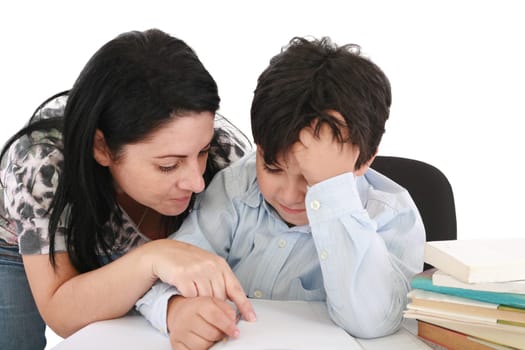 mother helping with homework to her son indoor