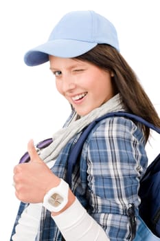 Smiling female teenager girl wear cool outfit thumb up