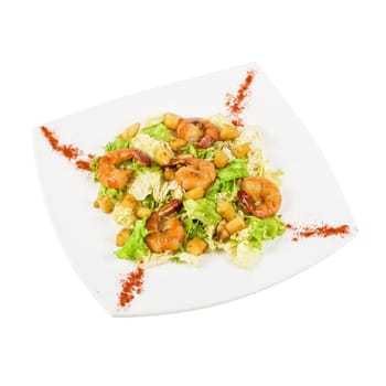 Salad with tiger shrimps and vegetable closeup