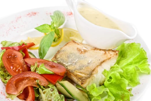 Tasty fish pike perch with mix of vegetables
