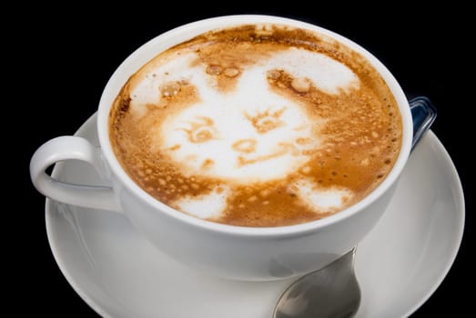 Cup of latte on a dark background