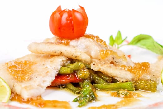 halibut filet roast at lime juice and vegetables