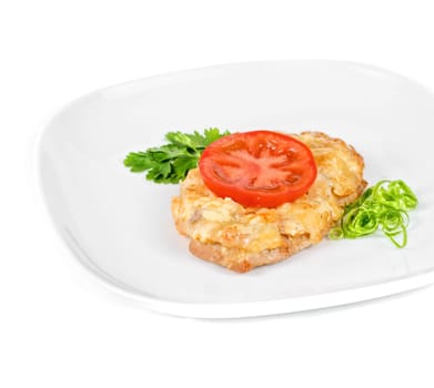 Roasted pork steak baked with cheese and tomato