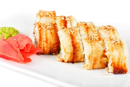Sushi rolls at plate isolated on a white