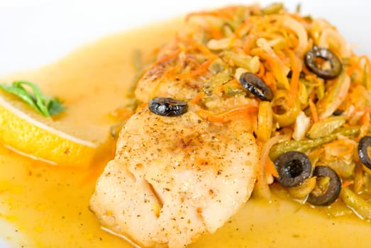 Tasty fish pike perch with mix of vegetables