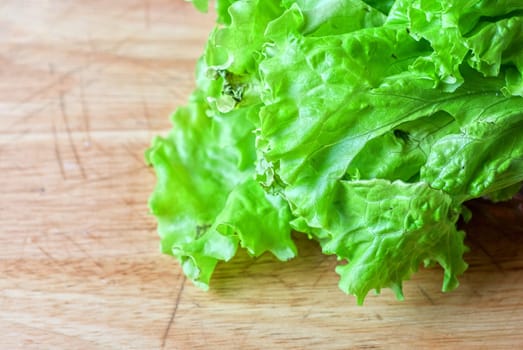 ripe lettuce on the wood table