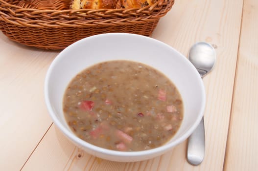 Lentil Soup With Smoked Meat on Wooden Table