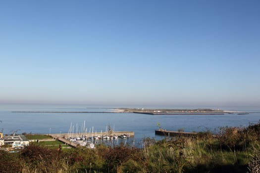 View over the marina of Heligoland to the neighboring island of Düne