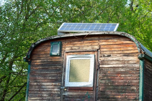 Dilapidated construction trailer with solar system