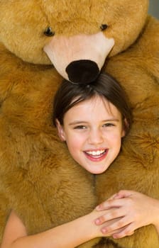 Little girl with teddy bear