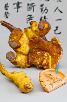 Ear cupuncture,ginseng root and lingzhi mushroom