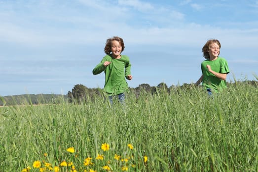 healthy fit kids running through field