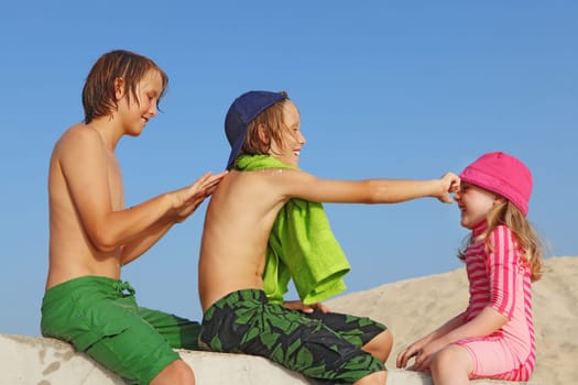 summer vacation kids with sun protection cream