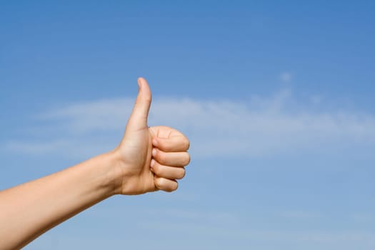 hand with thumbs up for success or winning