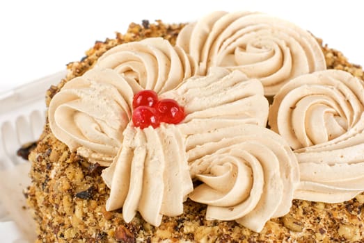 cake closeup with berry isolated on a white