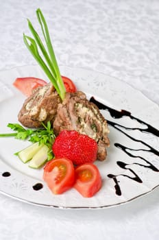 Pork rolls with cheese and vegetables: onion, cucumbers, tomatoes