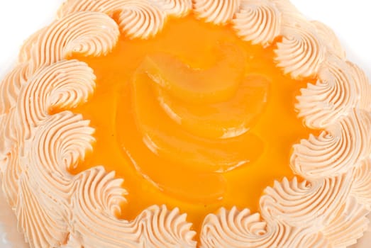 fruit orange cake closeup isolated on a white