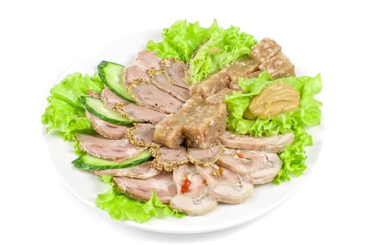 Closeup jellied minced meat and meat cuts on green salad