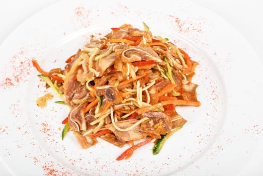 Salad with pig ear with celery, carrot, pepper, cucumber and garlic
