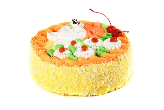 cream cake closeup with cherry on a grey
