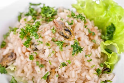 risotto with seafood isolated on a white