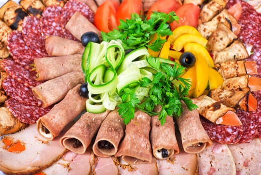meat cuts with vegetables on a white background