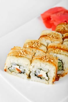 Sushi rolls at plate isolated on a white