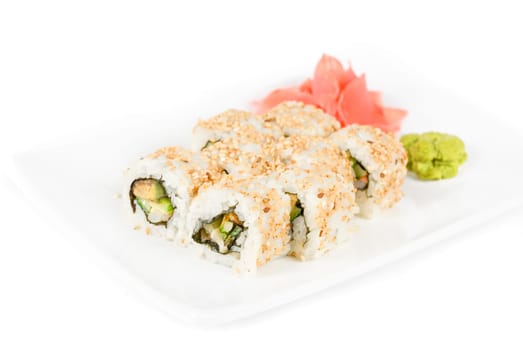 Sushi rolls at plate isolated on a white