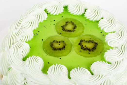 fruit kiwi cake closeup isolated on a white