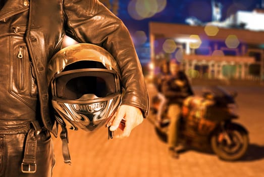 Biker closeup at night city background