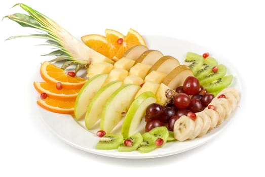 Fruit assortment closeup at plate on a white background