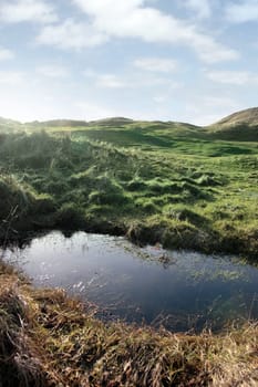 a water trap on a links golf course in ireland