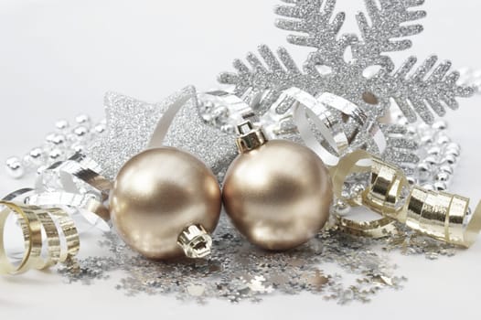 Christmas background with decorations in gold and silver
