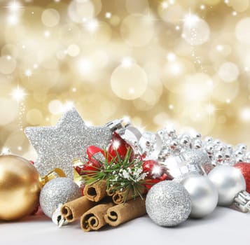 Christmas decorations on a glittery gold background
