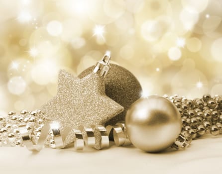 Golden Christmas background with decorations and beads