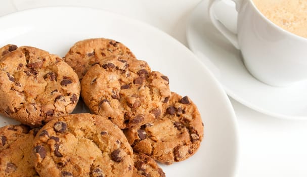 Chocolate Cookies and Espresso Coffee on Wooden Table