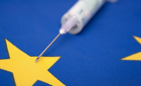 Financial Injection - Medical Syringe With Banknote one Flag of European Union