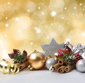 Christmas decorations on a glittery gold background