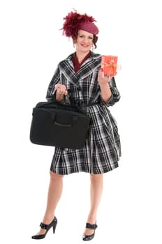 woman with a bag and gift  in a ladies&#039  hat isolated on white background