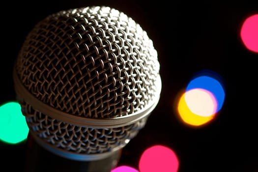 On stage microphone of a popular artist with spot lights
