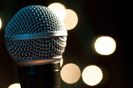 On stage microphone of a popular artist with spot lights