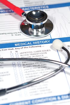 Close up of a Medical History form and a doctor&#039 s Stethoscope