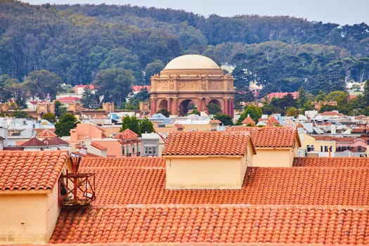 Image of Orange rooftop shingles overlooking buildings leading to Palace of Fine Arts Roman architecture