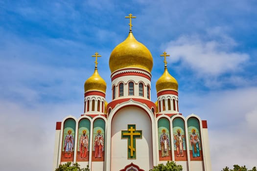 Image of Gorgeous blue sky with white misty clouds over Holy Virgin Cathedral in San Francisco