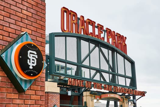Image of Oracle Park entrance sign for Home of the San Francisco Giants at Odoul Gate with logo