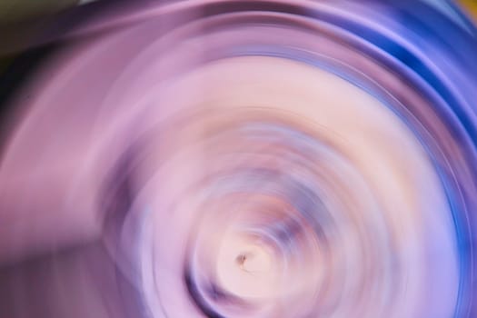 Image of Smoky purple artistic blur with outer dark blue rim of ripple drop in abstract art