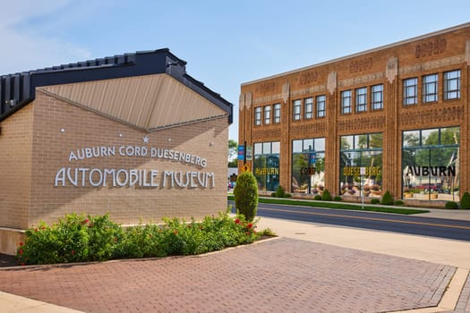 Image of ACD automobile museum front entrance sign with ACD museum in background